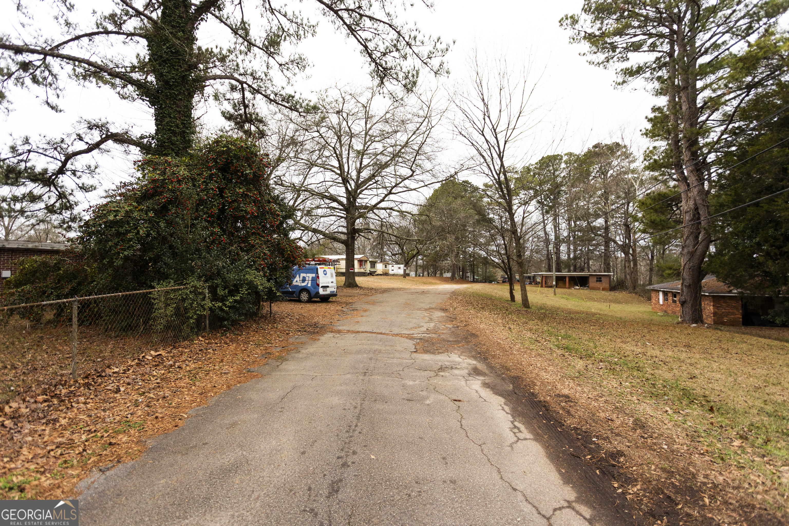 20 East Dollar Circle Covington, GA 30014 - Photo 6 of 31 a view of park with large trees