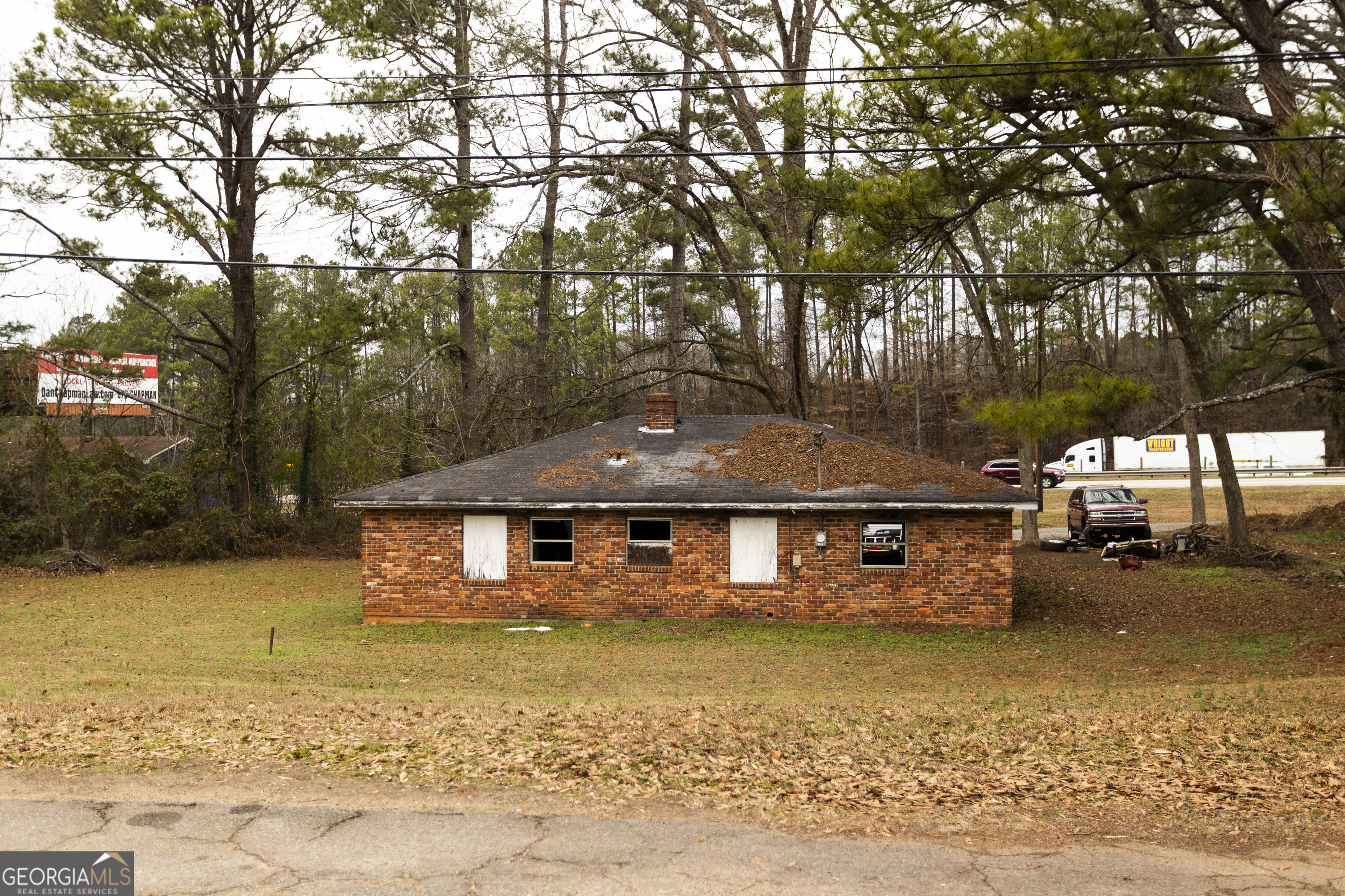 20 East Dollar Circle Covington, GA 30014 - Photo 7 of 31 a front view of a house with a yard and lake view