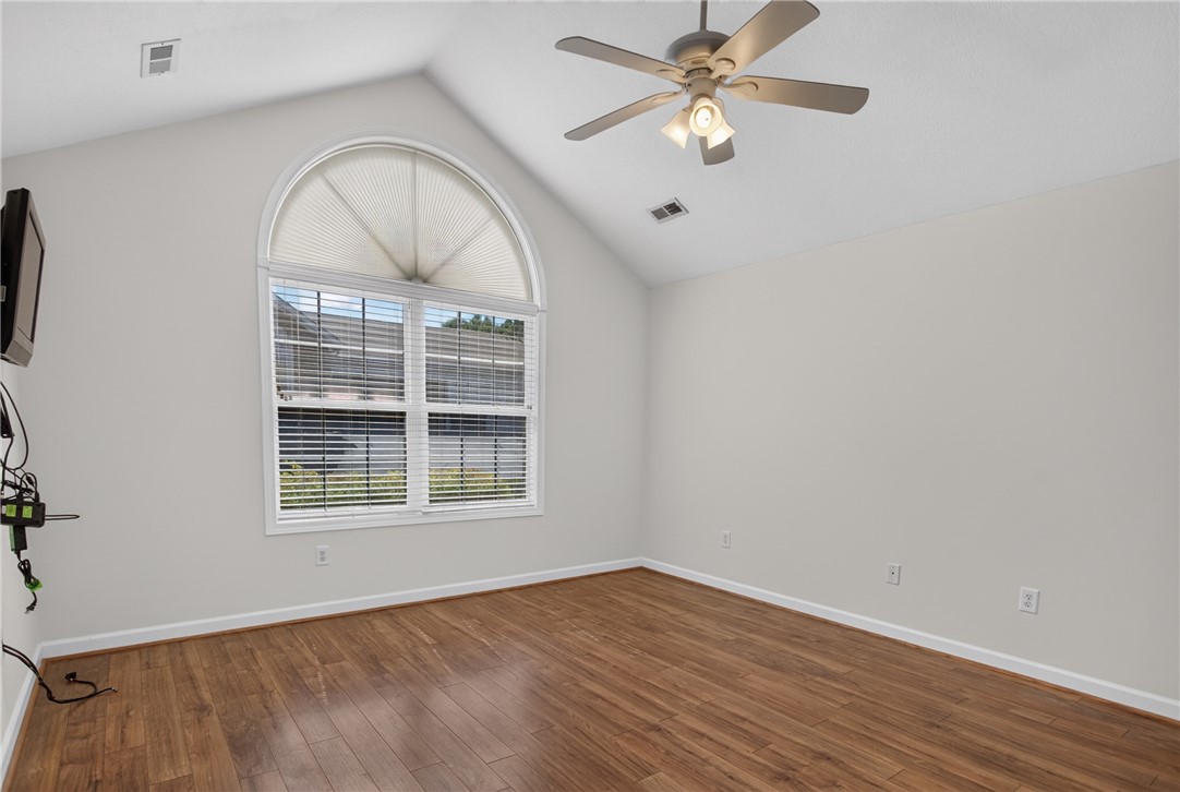 134 Life Style Lane Anderson, SC 29621 - Photo 18 of 44 A window with an arched top illuminates this room, complemented by a ceiling fan for comfortable airflow.