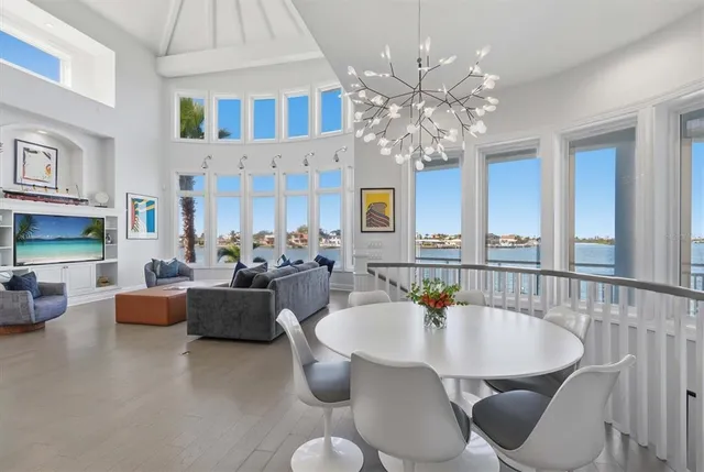 a living room with fireplace furniture and flat screen tv