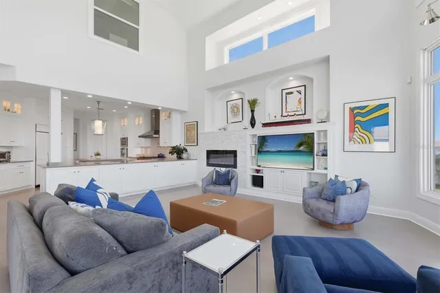 a spacious bedroom with a bed furniture and a window