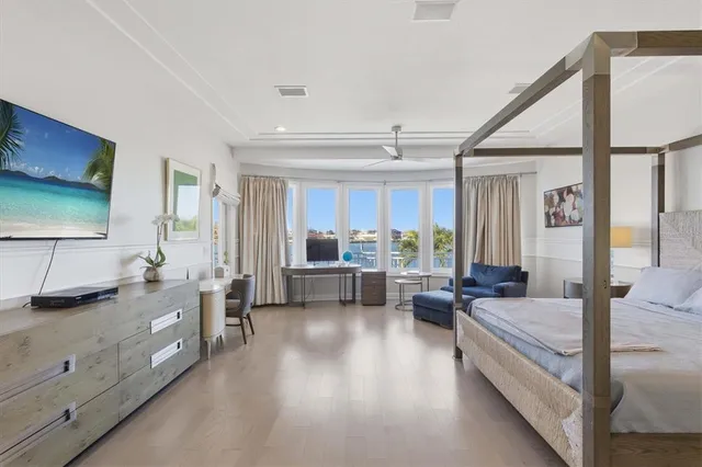 a bathroom with a toilet a sink and shower