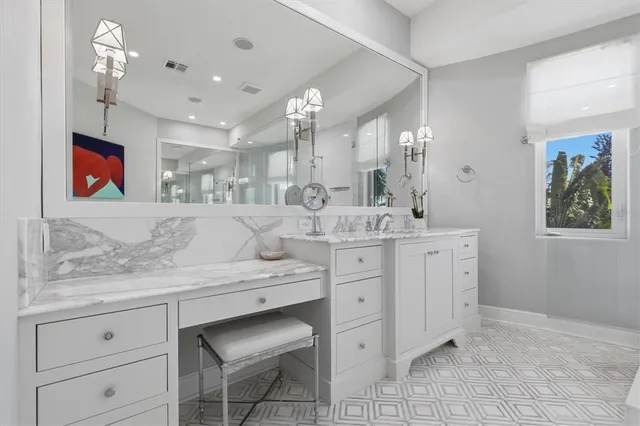 a utility room with sink dryer and washer