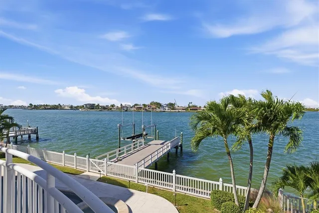 a view of a balcony with a lake view