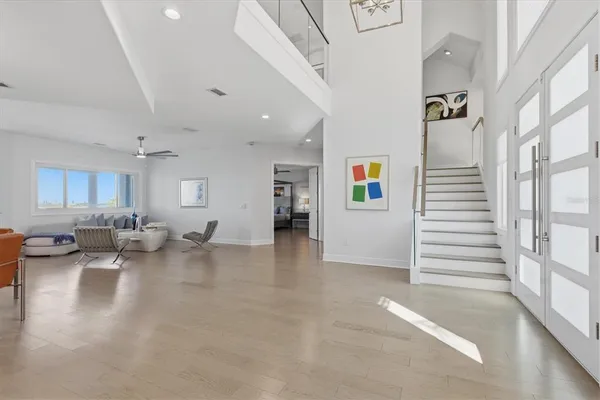 a view of dining room with furniture and wooden floor