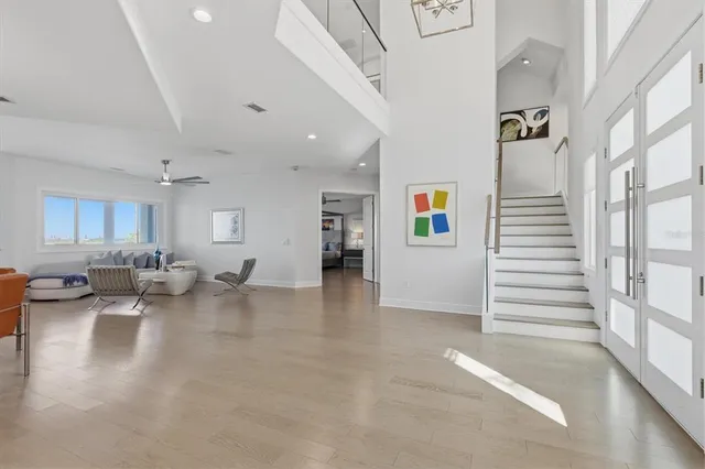 a view of dining room with furniture and wooden floor