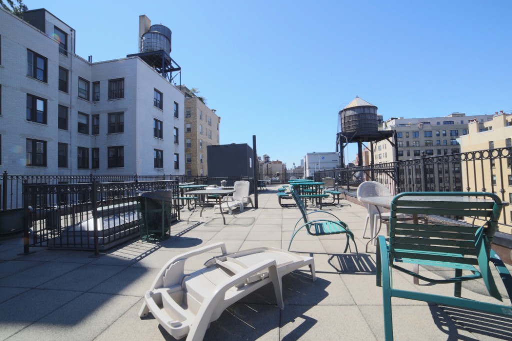 304 West 92nd Street, Unit 4/A Manhattan, NY 10025 - Photo 5 of 15 a view of a patio with chairs and potted plants