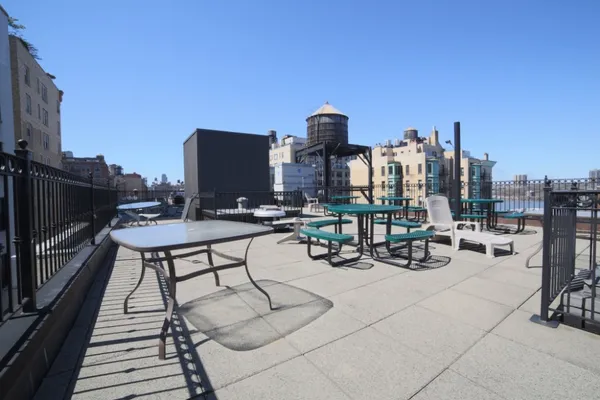a view of a terrace with sitting area