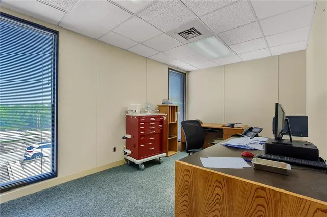 a room with furniture and a window