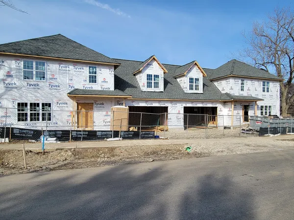 front view of a house with a street