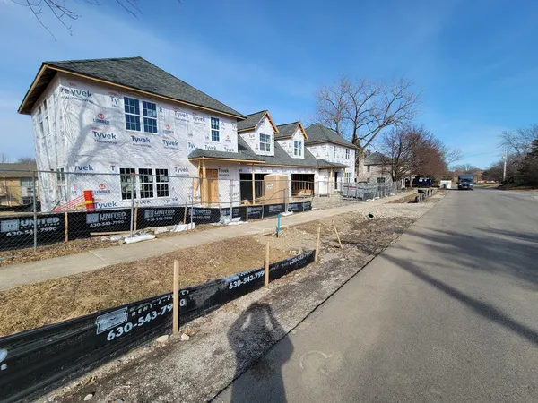 a view of a street with houses