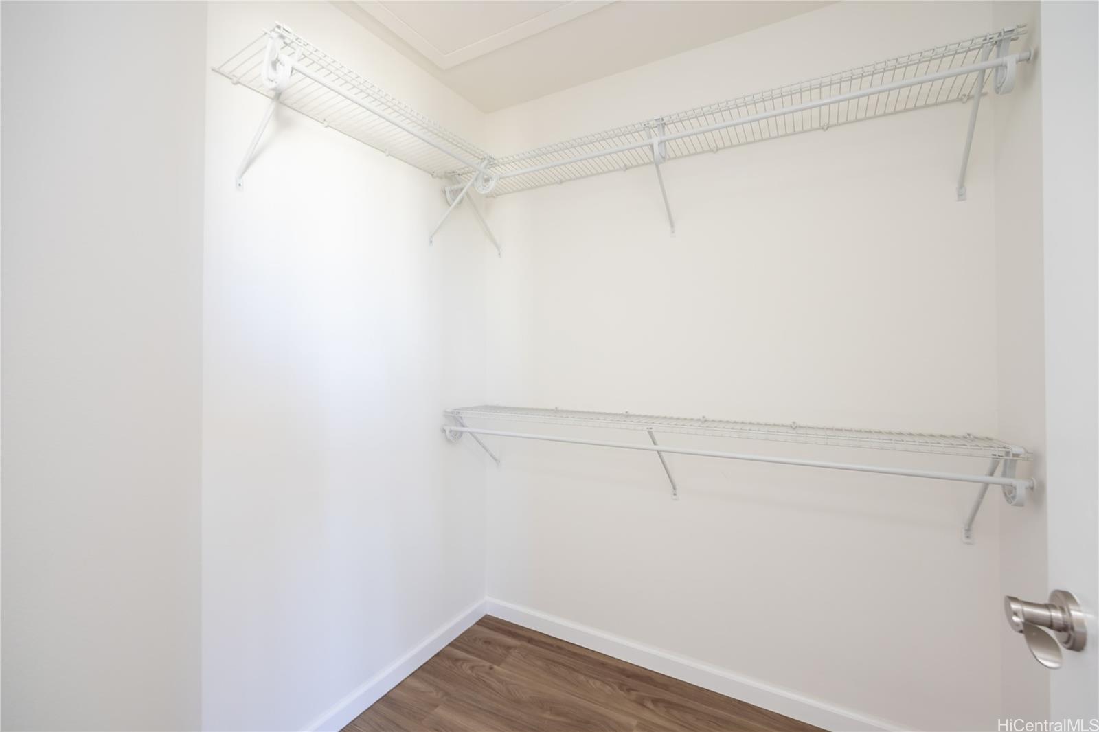 87-176 Maipalaoa Road, Unit Q38 Waianae, HI 96792 - Photo 15 of 18 a view of a room with racks on the wall