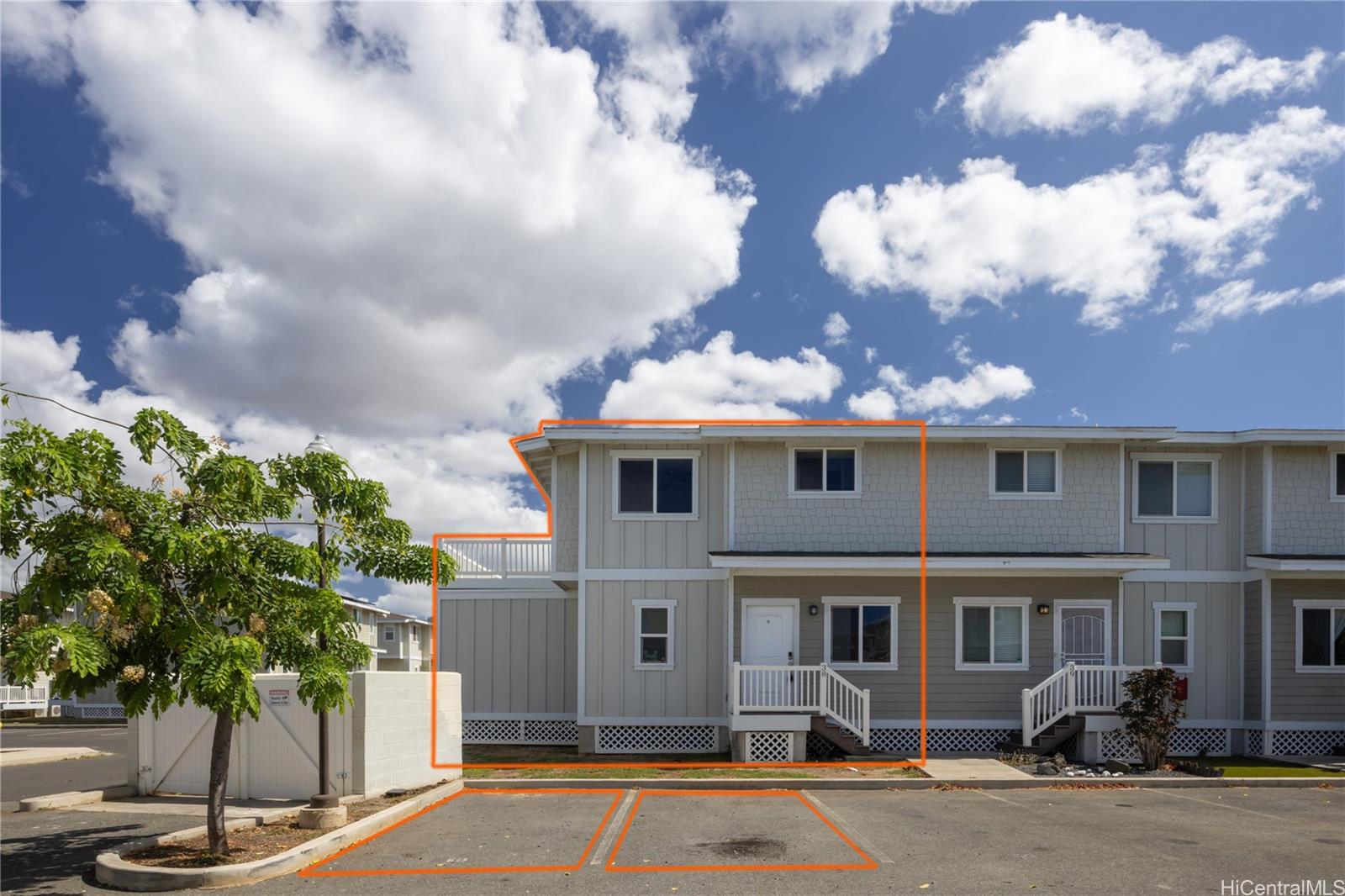 87-176 Maipalaoa Road, Unit Q38 Waianae, HI 96792 - Photo 18 of 18 a front view of a house with a yard