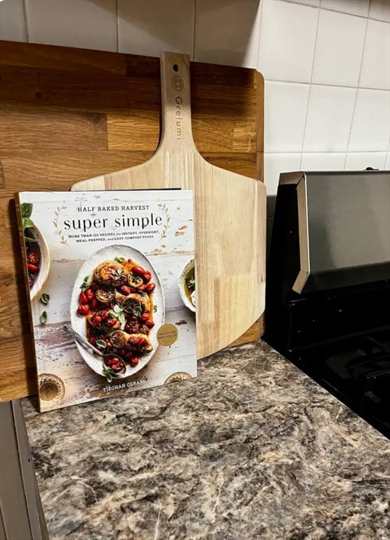 218 Wood Avenue, Unit 1 Boston, MA 02136 - Photo 9 of 11 a view of a wooden floor in a kitchen