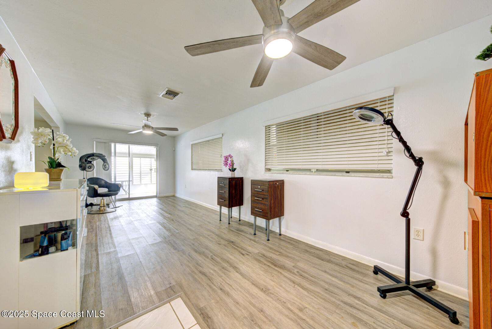 375 Cyprus Drive Cocoa Beach, FL 32931 - Photo 14 of 38 dining room with fan (1)