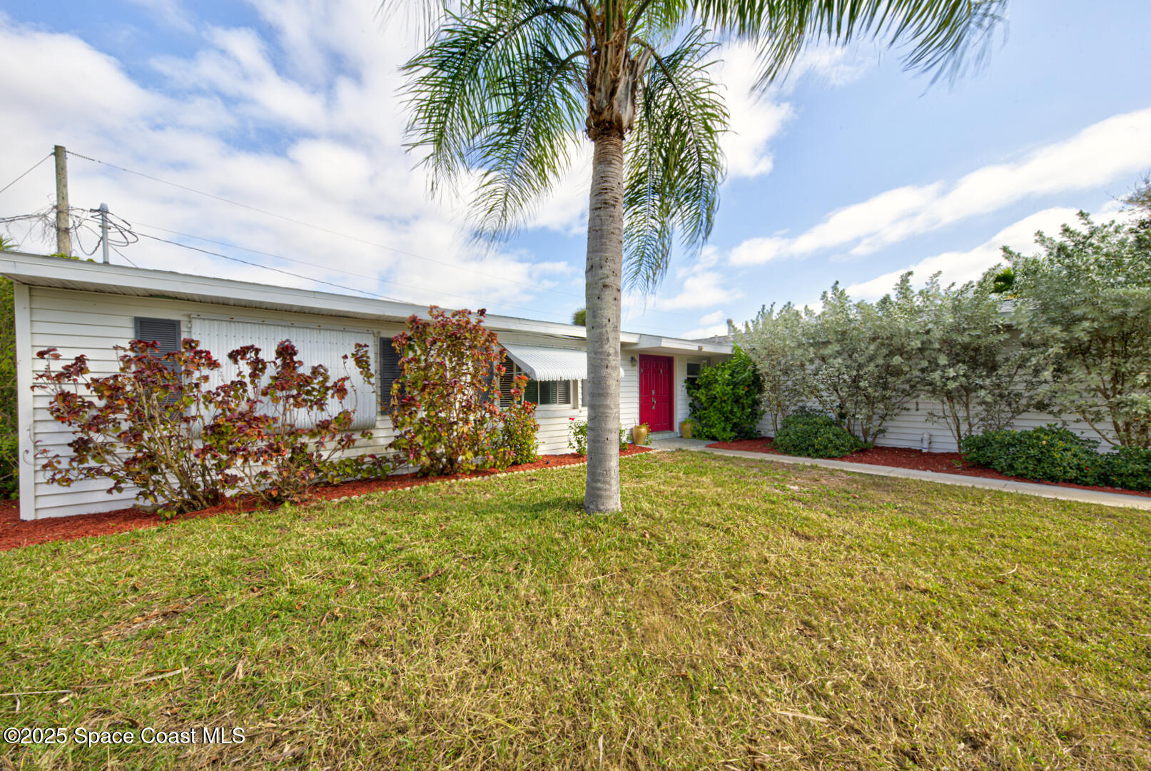 375 Cyprus Drive Cocoa Beach, FL 32931 - Photo 2 of 38 front of house left (7)