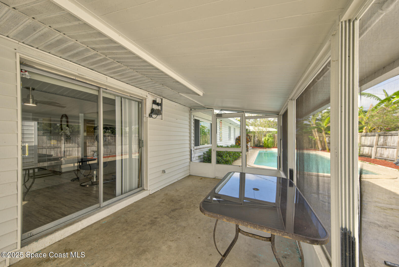 375 Cyprus Drive Cocoa Beach, FL 32931 - Photo 32 of 38 screened in back porch (3)