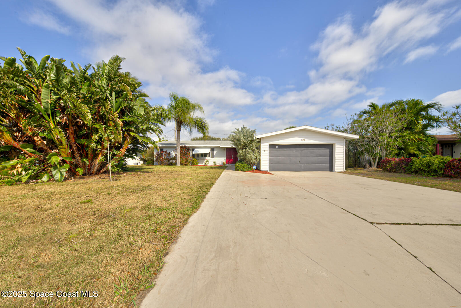 375 Cyprus Drive Cocoa Beach, FL 32931 - Photo 33 of 38 front yard (6)