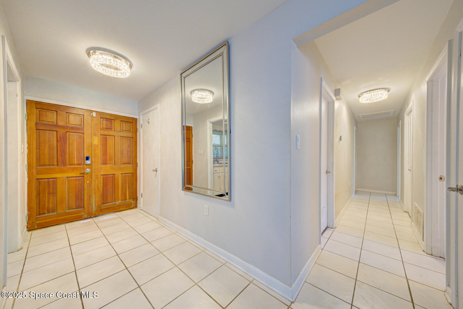 375 Cyprus Drive Cocoa Beach, FL 32931 - Photo 5 of 38 foyer & hall