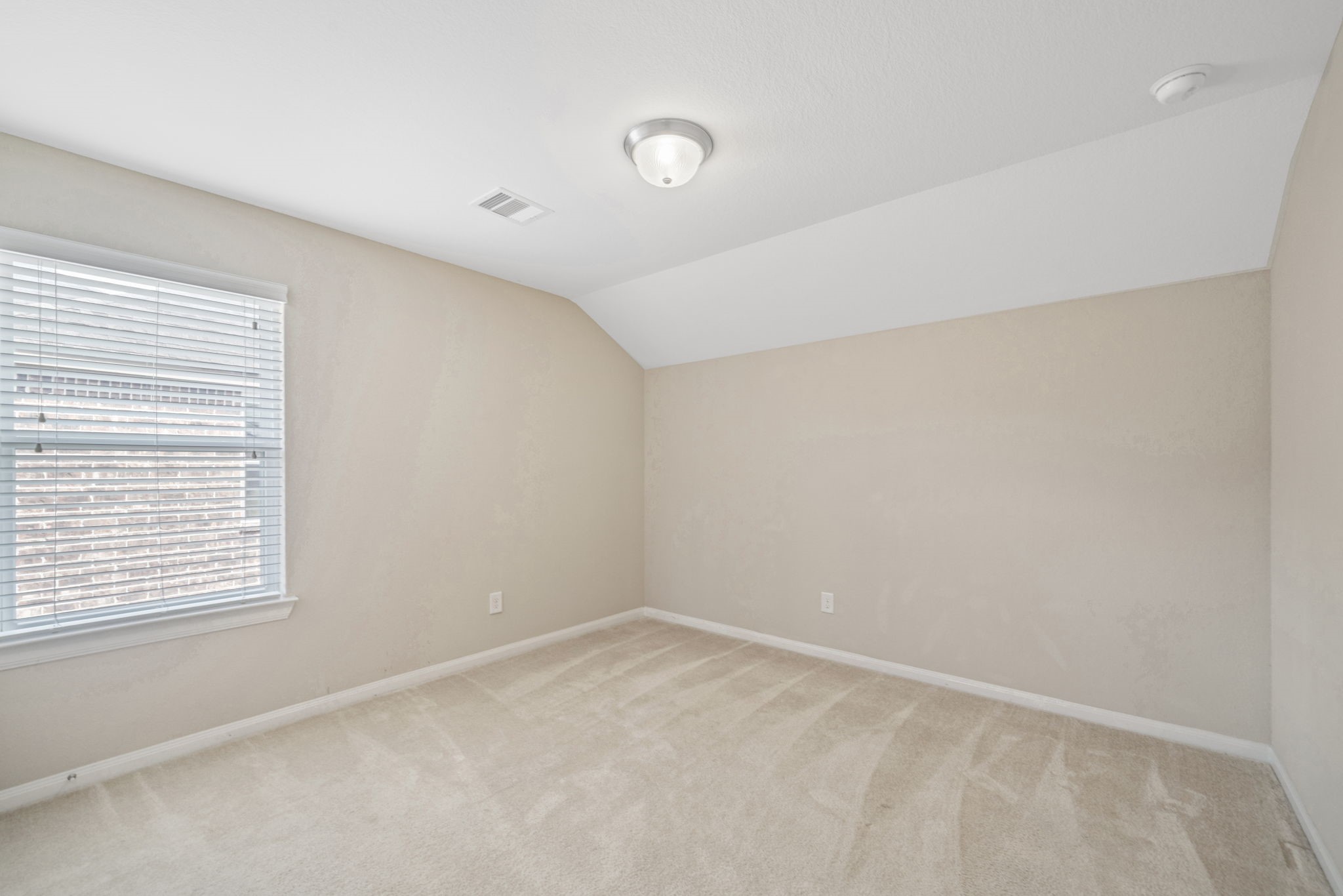 22523 Birch Ridge Meadow Drive Spring, TX 77389 - Photo 28 of 39 an empty room with a window