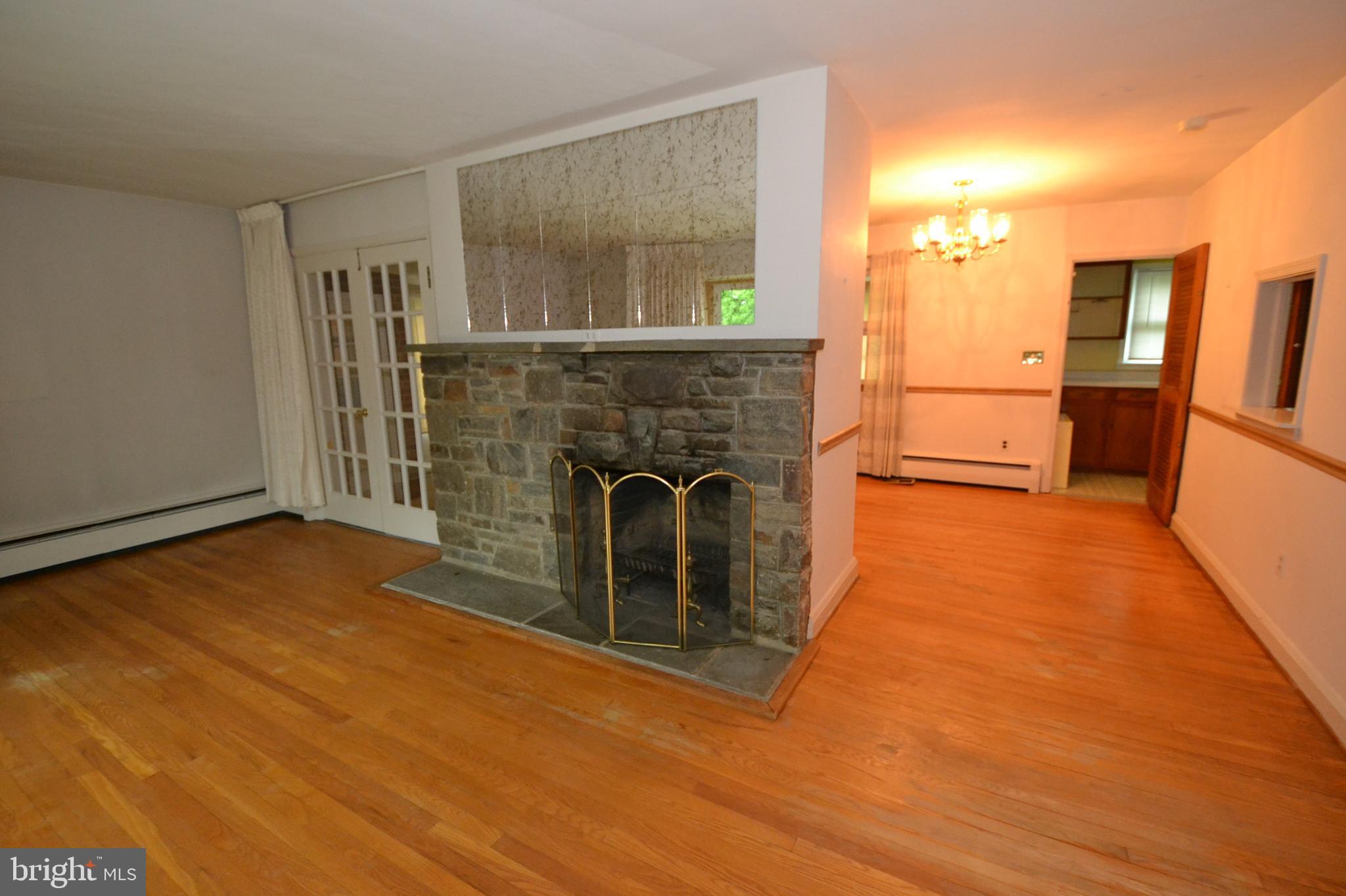 6106 Rusk Avenue Baltimore, MD 21209 - Photo 4 of 42 Living room/Entrance to Dining room