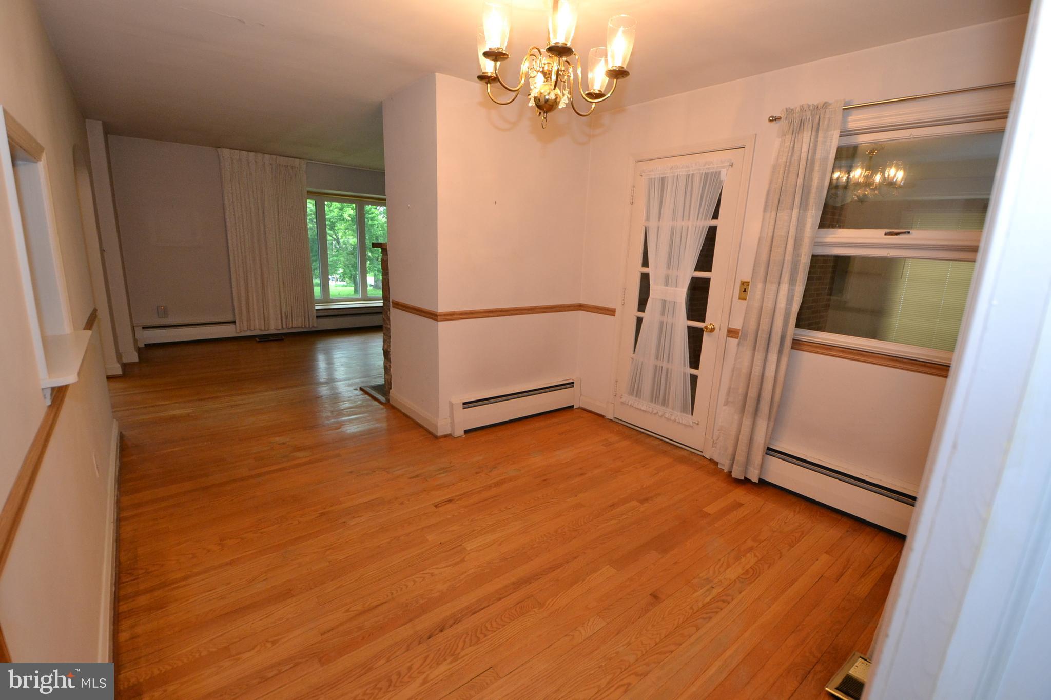 6106 Rusk Avenue Baltimore, MD 21209 - Photo 7 of 42 View from Dining room to Living room