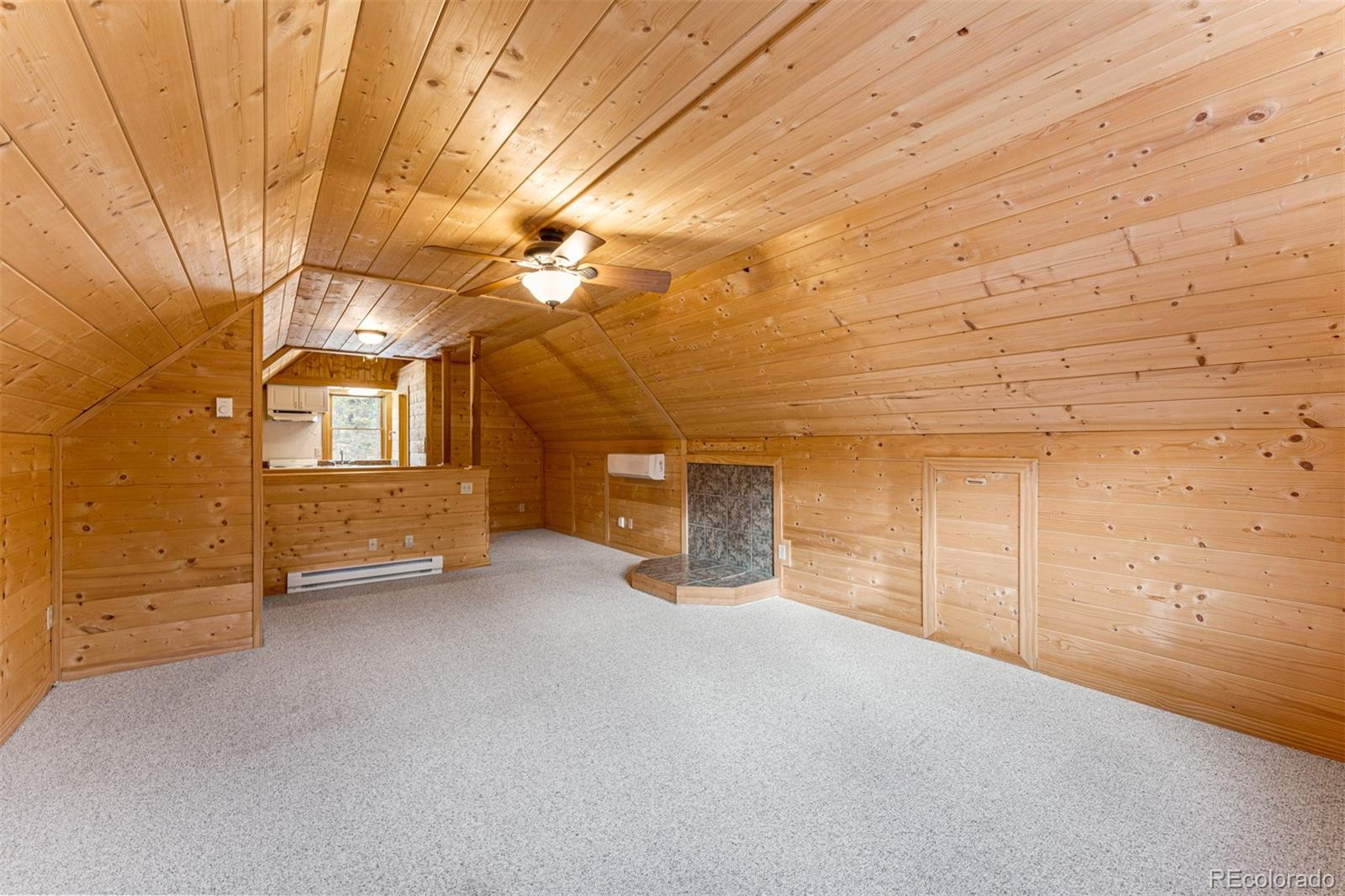 1057 Reed Ranch Road Boulder, CO 80302 - Photo 34 of 40 a view of a livingroom with an empty space and wooden roof