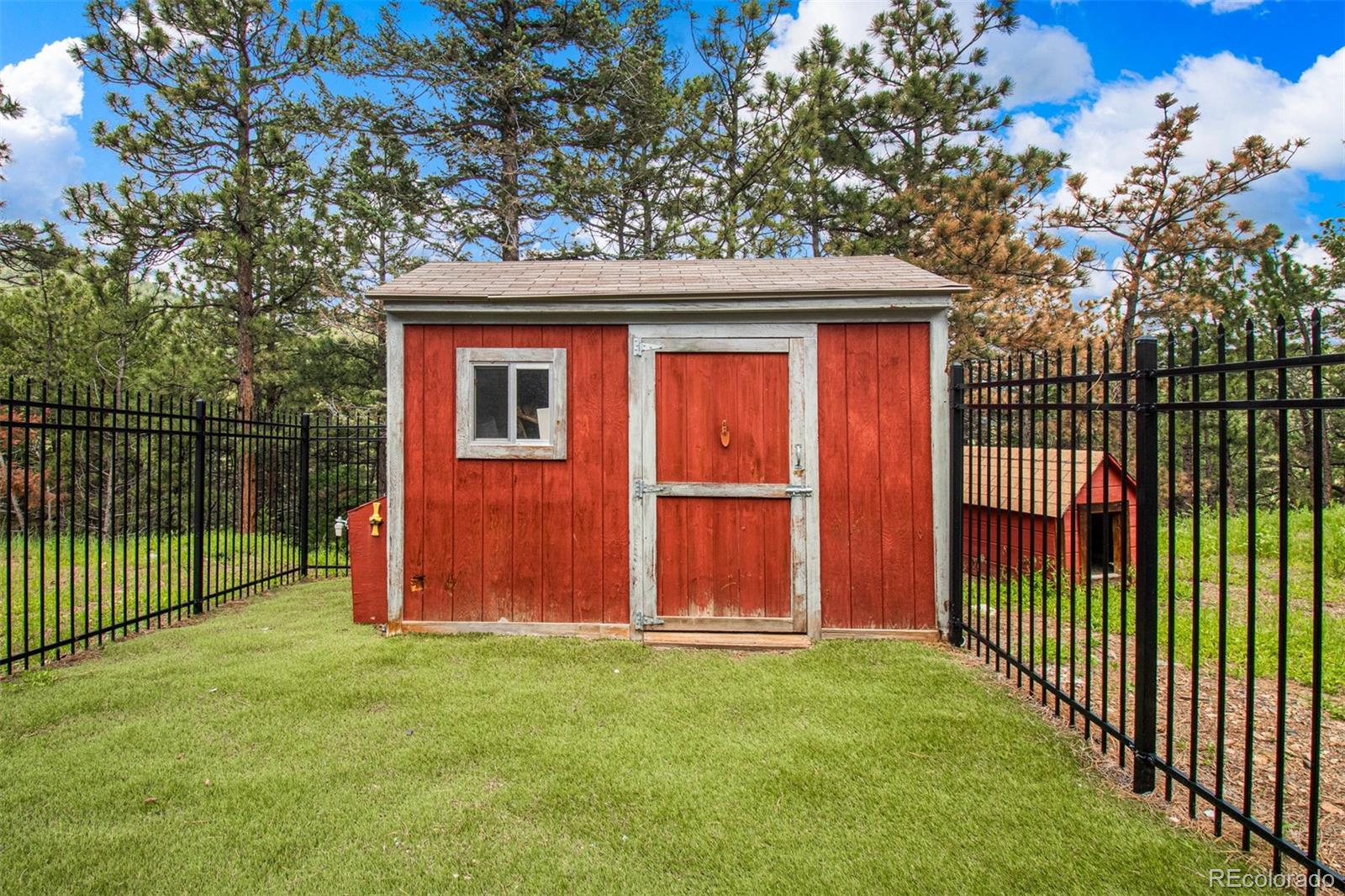 1057 Reed Ranch Road Boulder, CO 80302 - Photo 38 of 40 a view of backyard with green space
