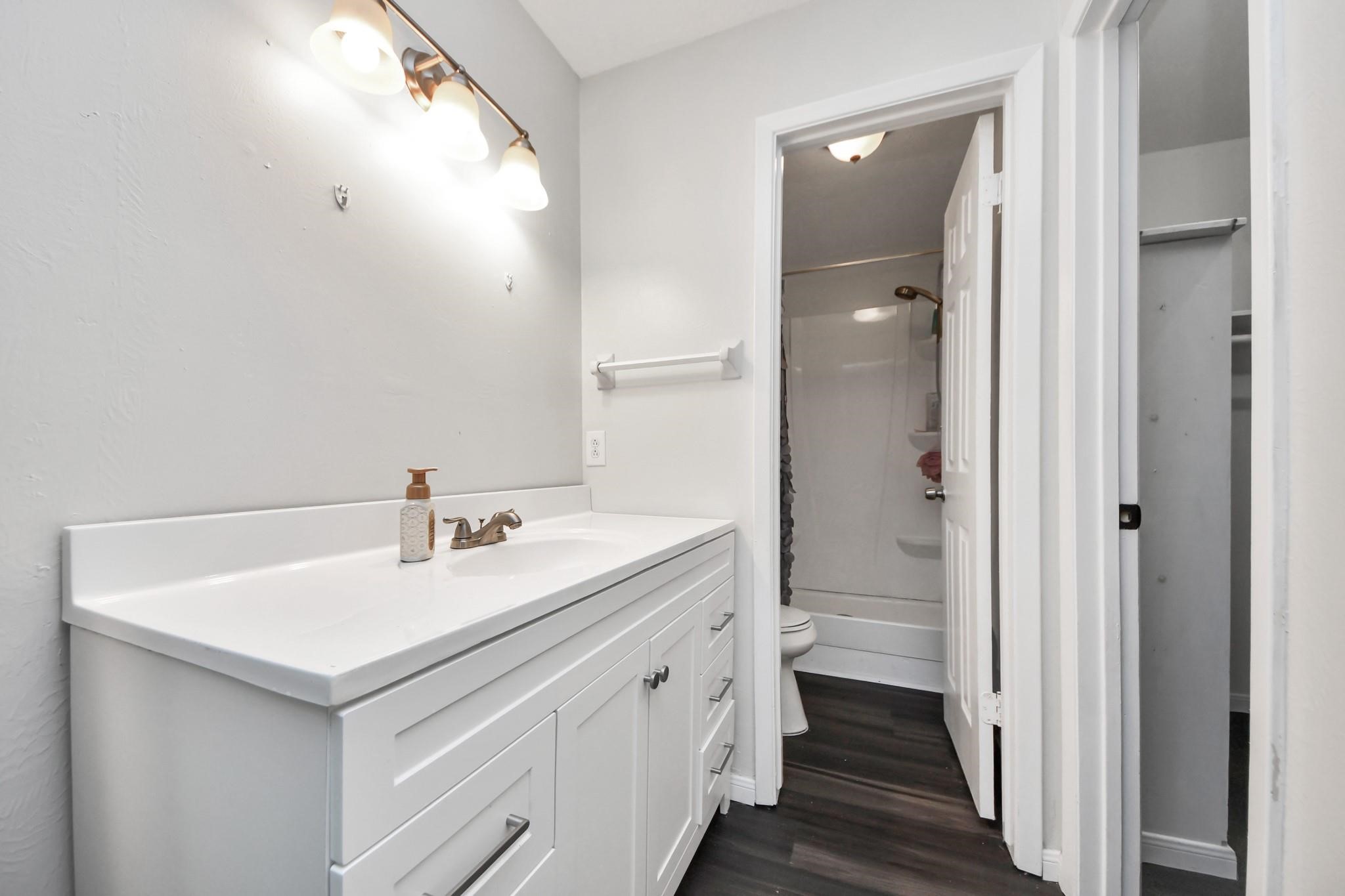 1415 Parry-Sound Pasadena, TX 77504 - Photo 15 of 34 a bathroom with a sink and a mirror