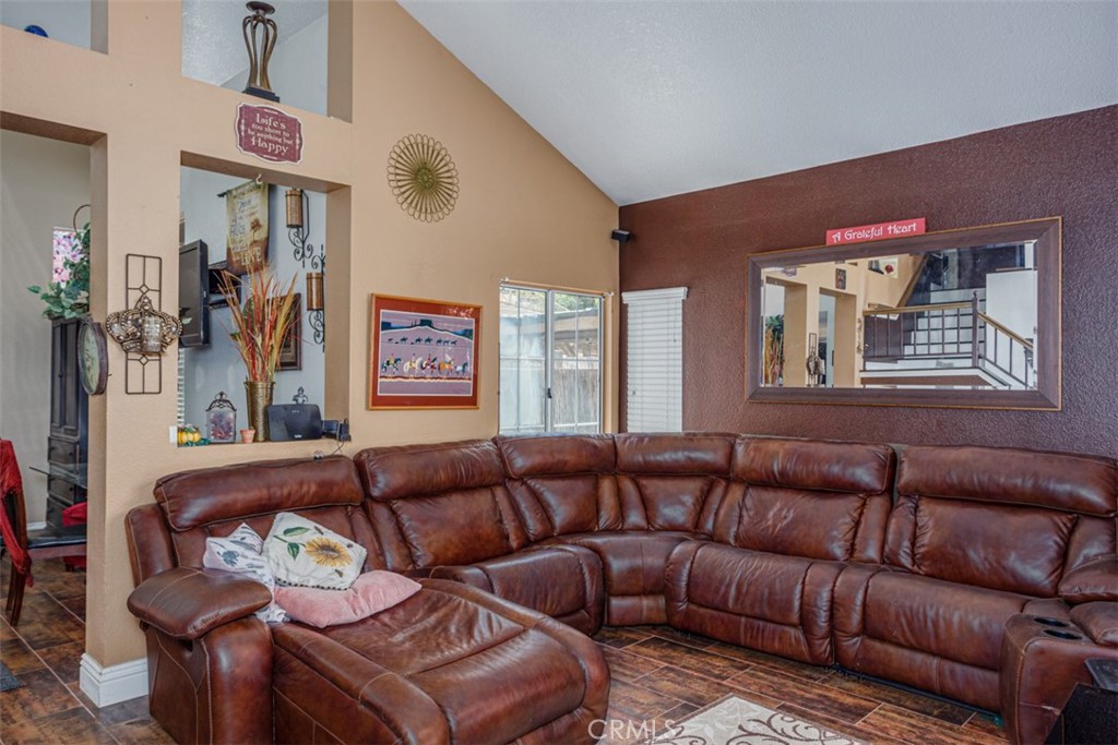 13365 Cloudburst Drive Corona, CA 92883 - Photo 12 of 21 a living room with furniture and a window