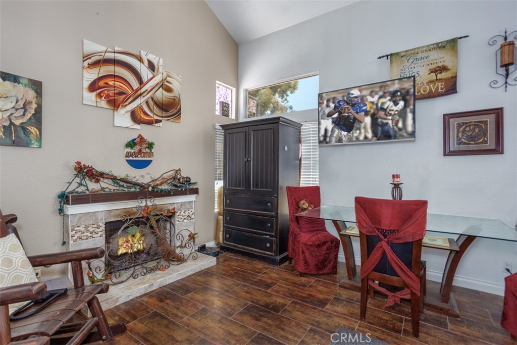 13365 Cloudburst Drive Corona, CA 92883 - Photo 14 of 21 a living room with furniture and a fireplace