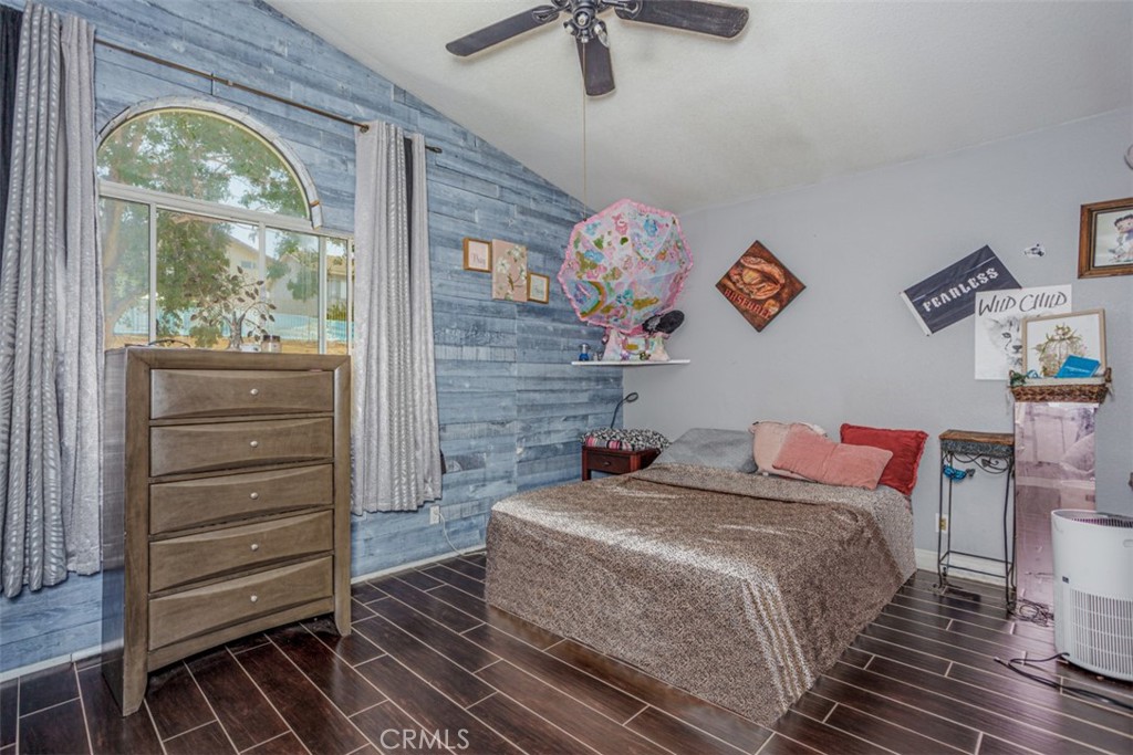 13365 Cloudburst Drive Corona, CA 92883 - Photo 4 of 21 a bedroom with a bed and a window