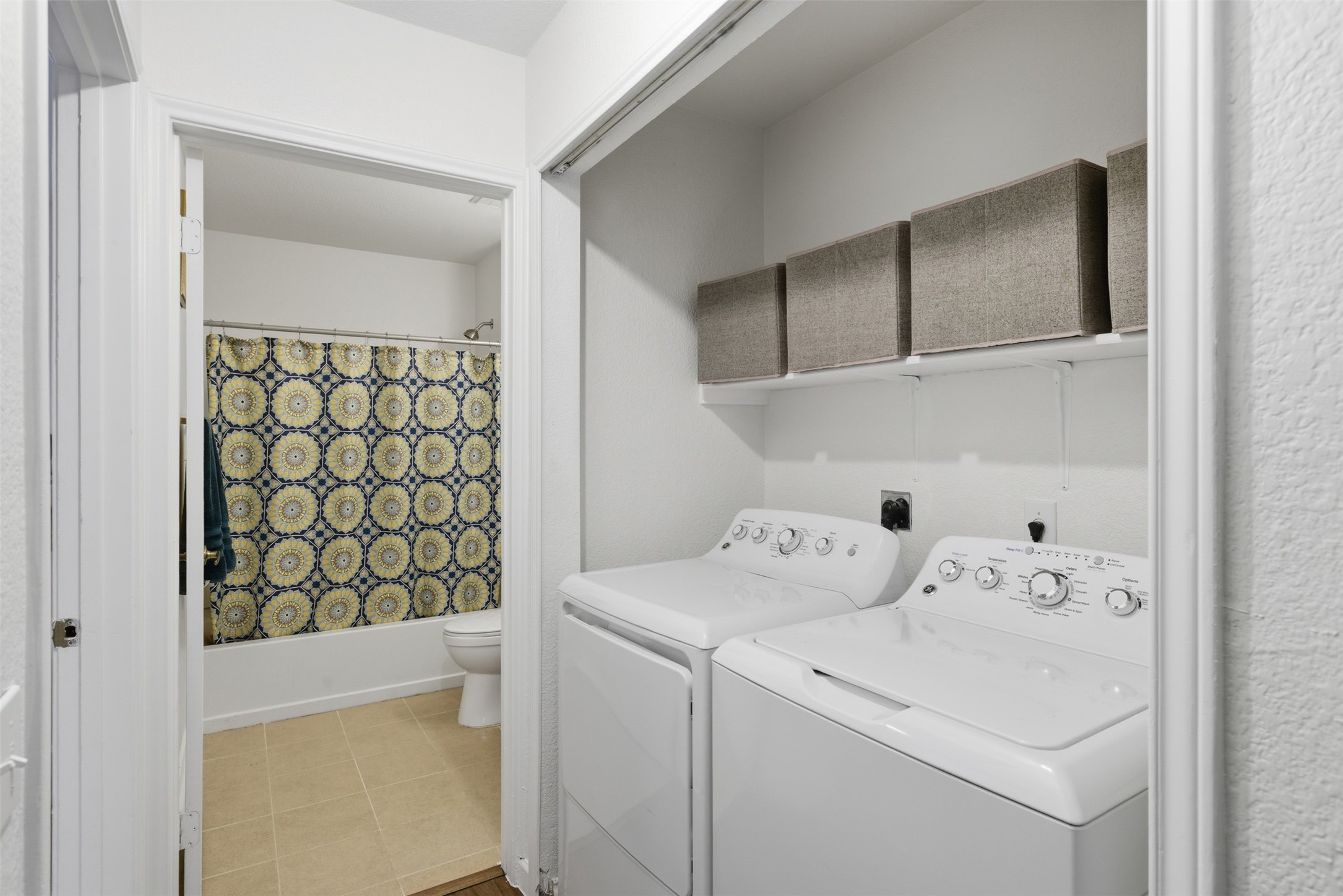 7536 Marble Ridge Drive Austin, TX 78747 - Photo 23 of 30 Laundry area with washing machine and dryer