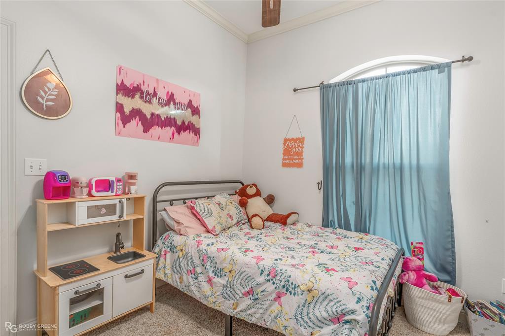 711 Reeds Reef Bossier City, LA 71112 - Photo 25 of 36 a bedroom with a bed and a window