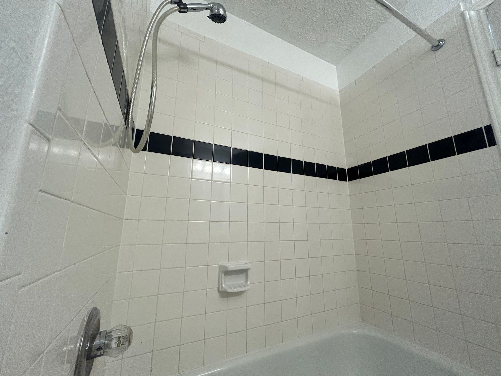 1614 Common Street Houston, TX 77009 - Photo 7 of 13 a bathroom with a shower and a bathtub