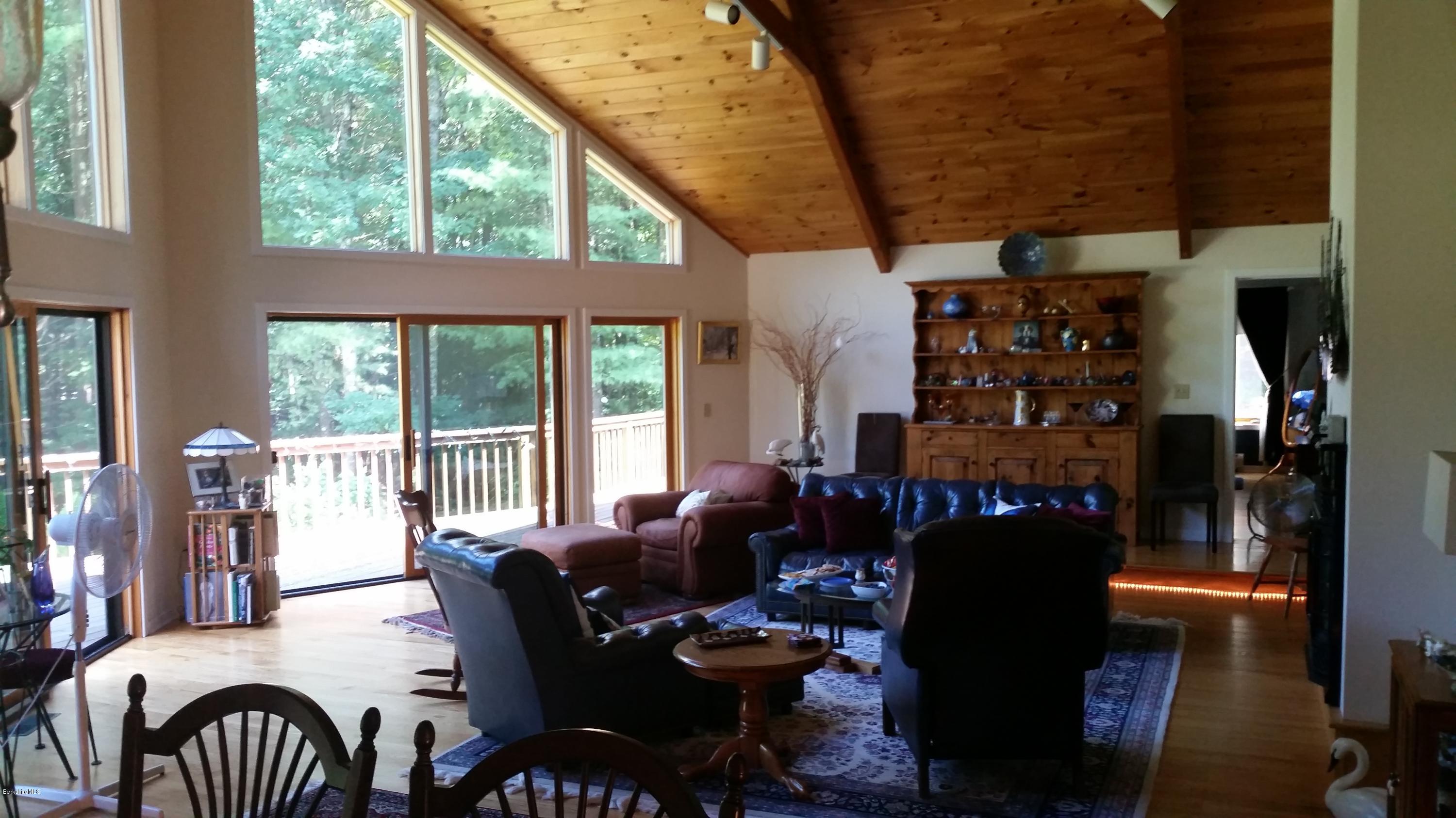 116 Otis Road Becket, MA 01223 - Photo 13 of 29 a living room with furniture and wooden floor