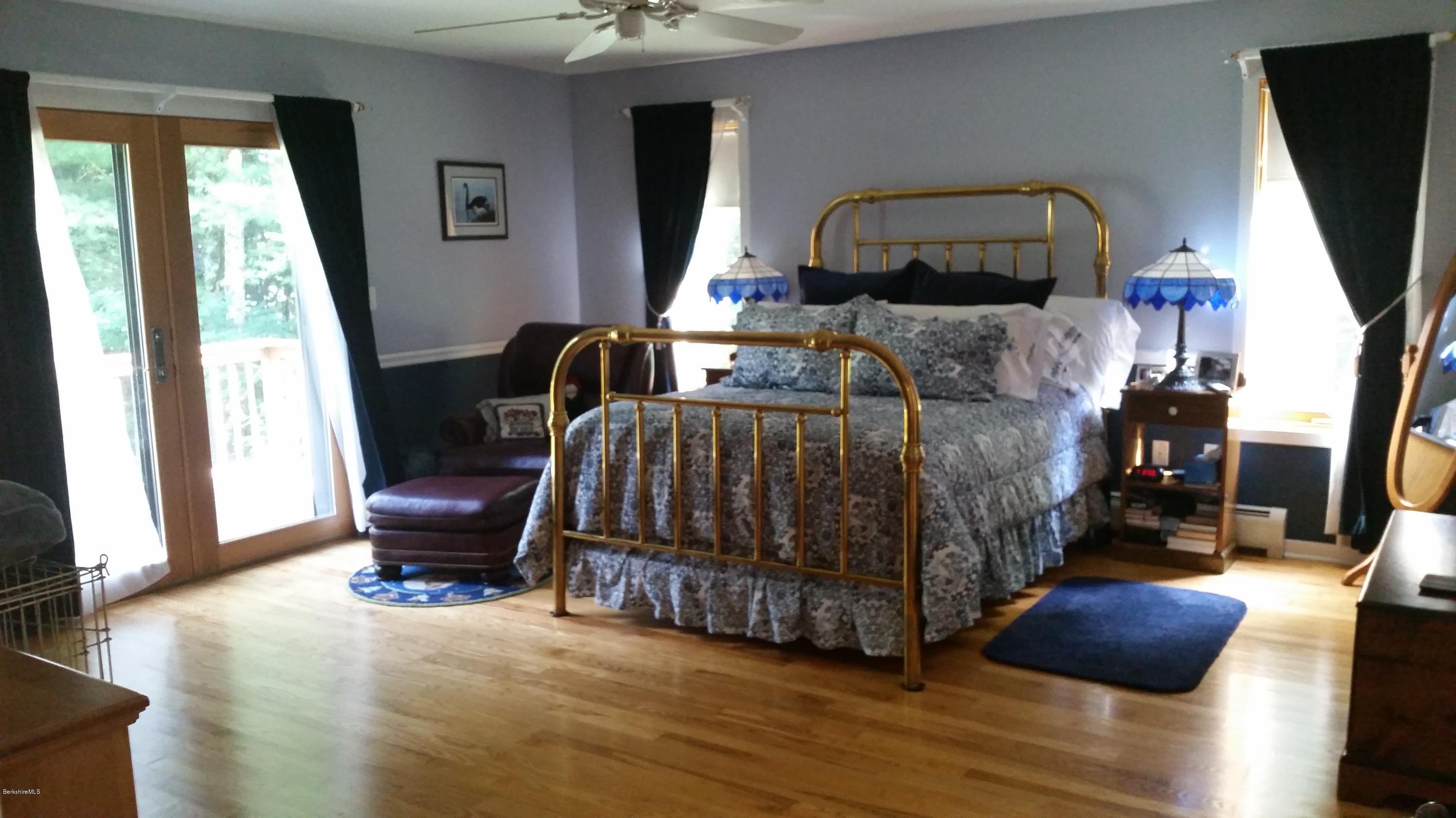 116 Otis Road Becket, MA 01223 - Photo 14 of 29 a bedroom with furniture and a window