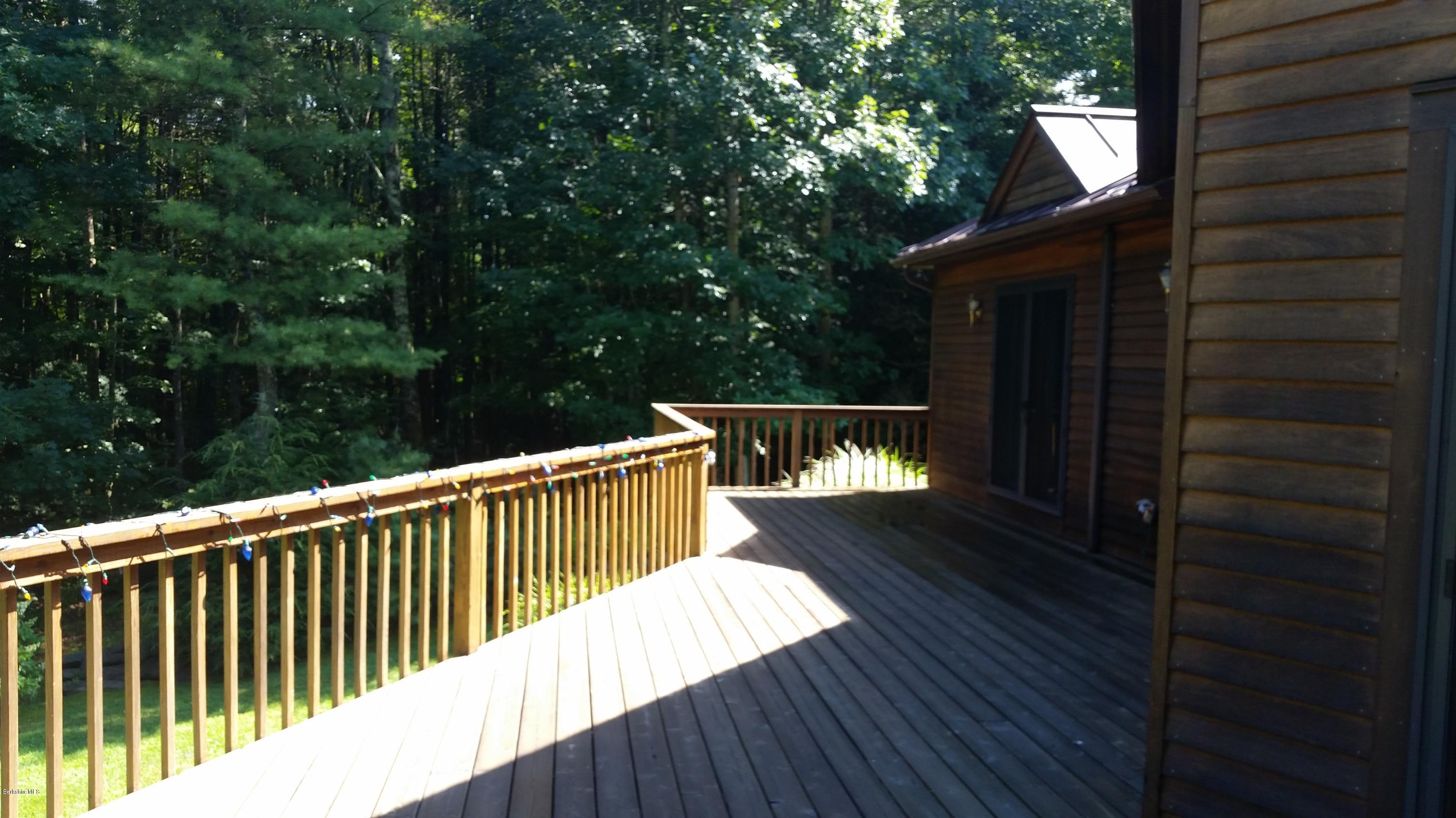 116 Otis Road Becket, MA 01223 - Photo 21 of 29 a balcony with wooden floor
