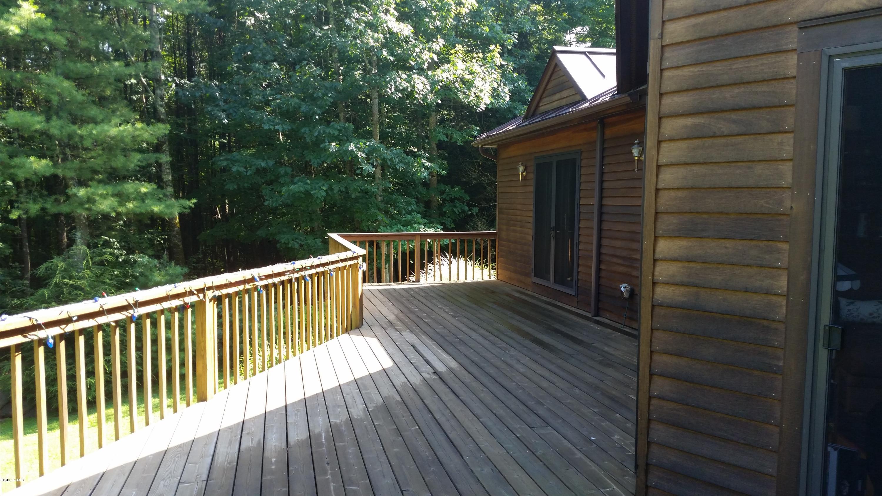 116 Otis Road Becket, MA 01223 - Photo 23 of 29 a view of a balcony with wooden floor