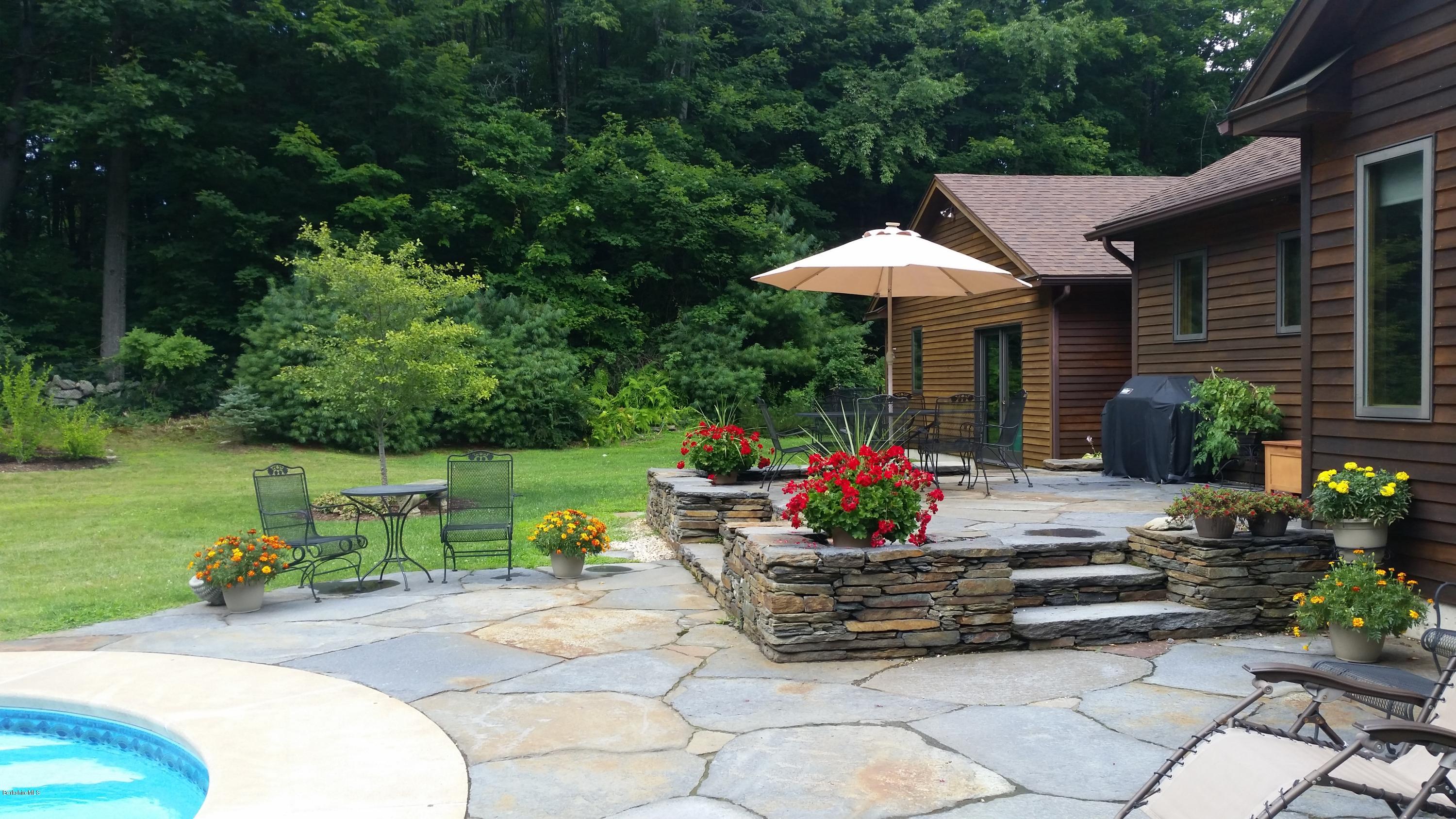 116 Otis Road Becket, MA 01223 - Photo 27 of 29 a garden view with a seating space