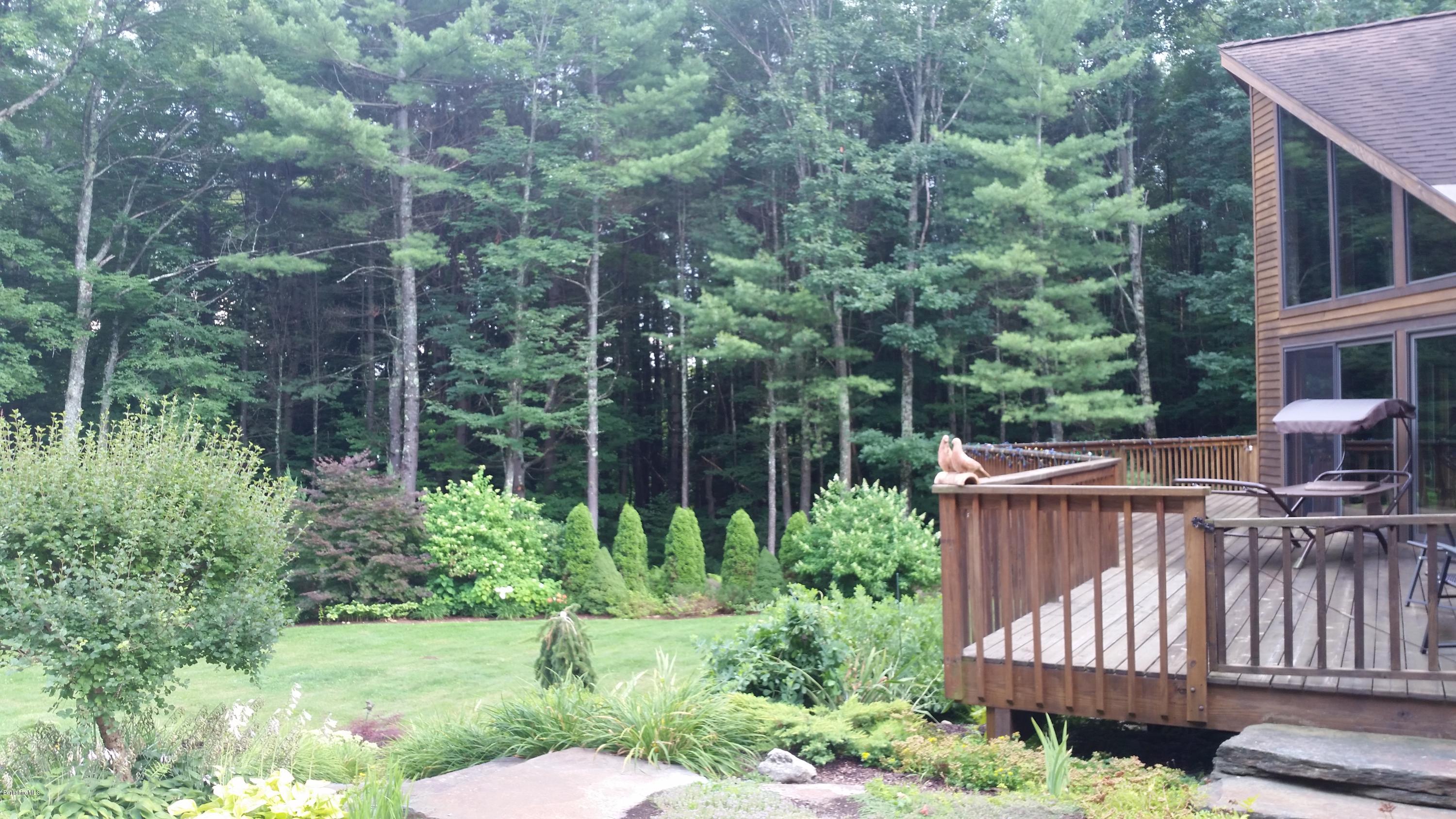 116 Otis Road Becket, MA 01223 - Photo 28 of 29 a view of a backyard with sitting area