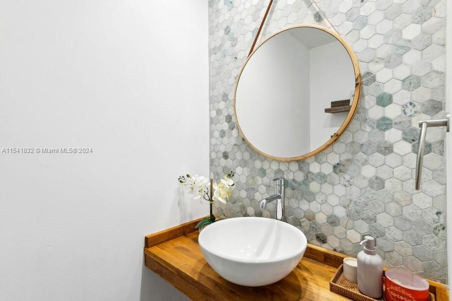 428 Southwest 23rd Road Miami, FL 33129 - Photo 16 of 41 Powder Room 1/2 bath on main level
