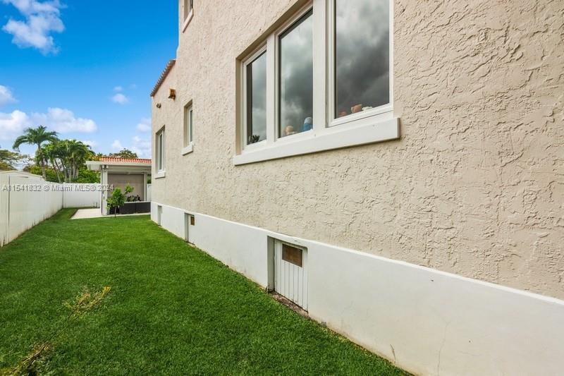 428 Southwest 23rd Road Miami, FL 33129 - Photo 37 of 41 PLEANTY OF GRASS FOR KICKING A BALL AROUND