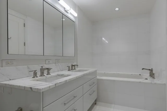 a bathroom with a sink and a bathtub