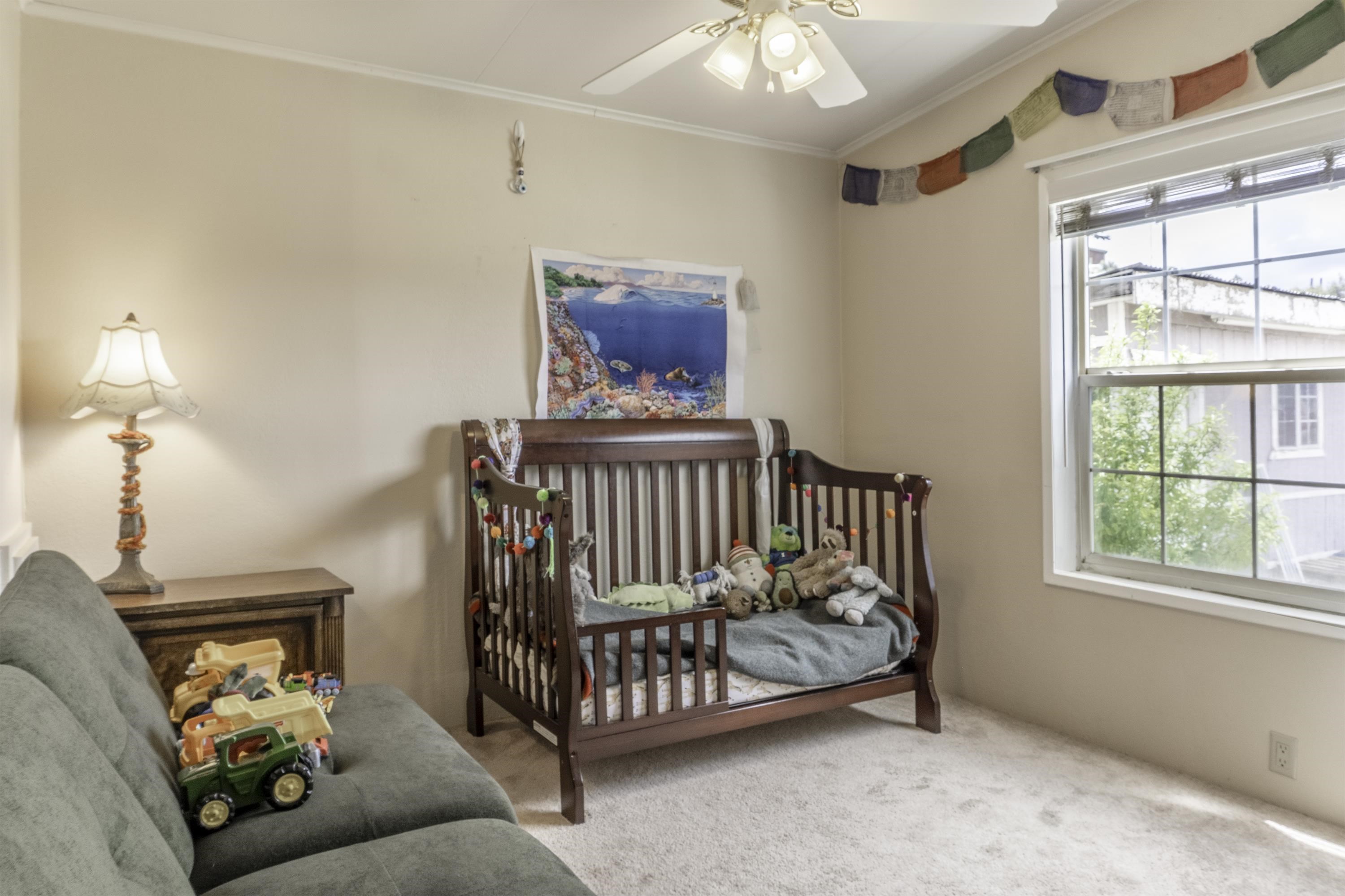 18 Eagle-Peak Bridgeport, CA 93517 - Photo 19 of 45 a bed sitting in a bedroom next to a window