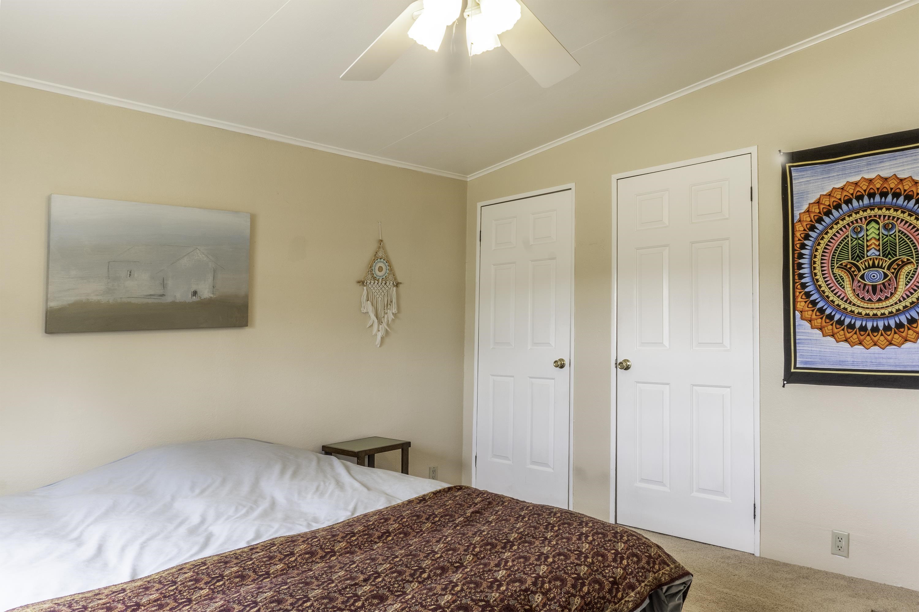 18 Eagle-Peak Bridgeport, CA 93517 - Photo 21 of 45 a bedroom with a bed and a painting on the wall