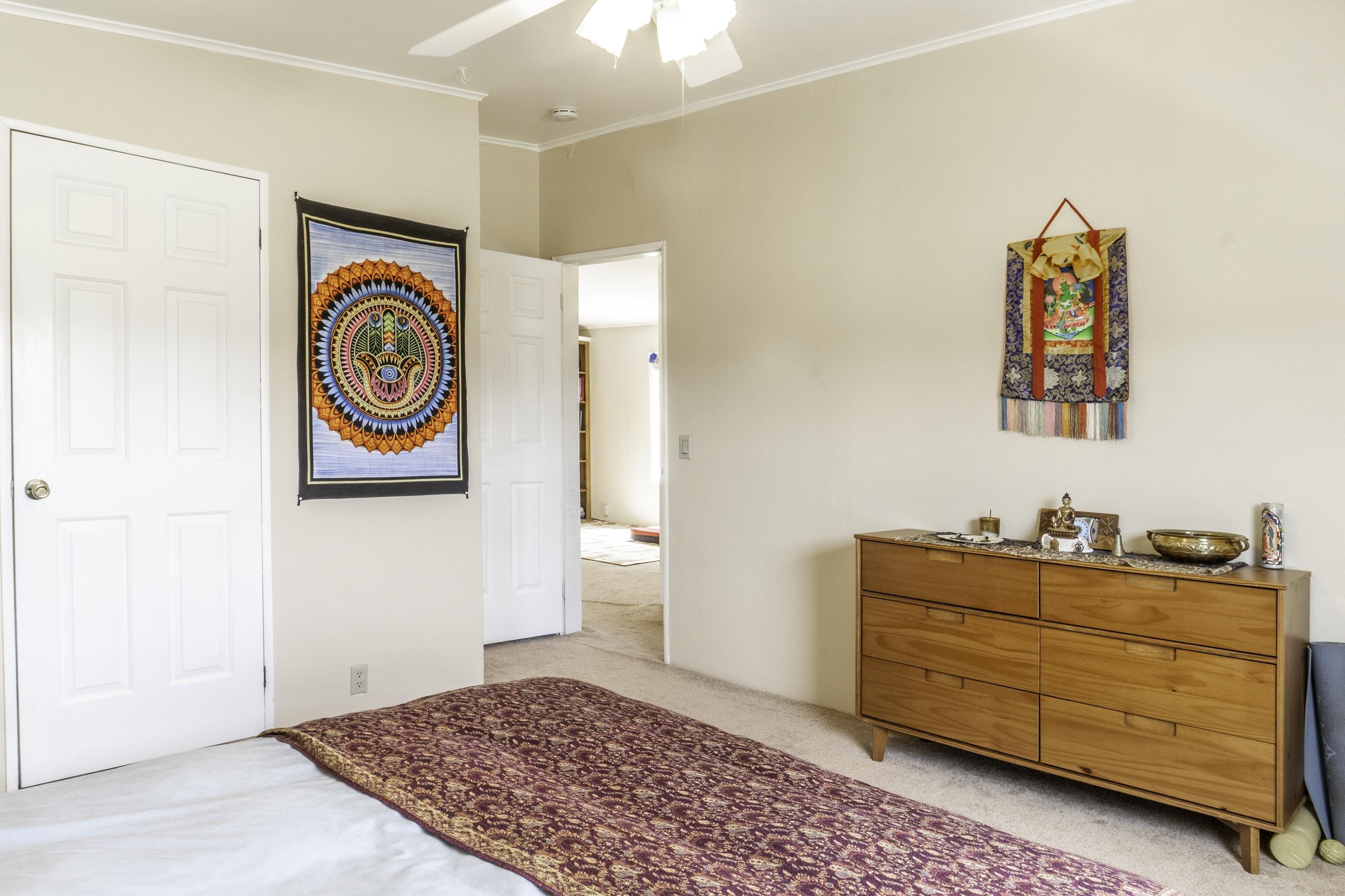 18 Eagle-Peak Bridgeport, CA 93517 - Photo 22 of 45 a cabinet with painting on the wall and a lamp