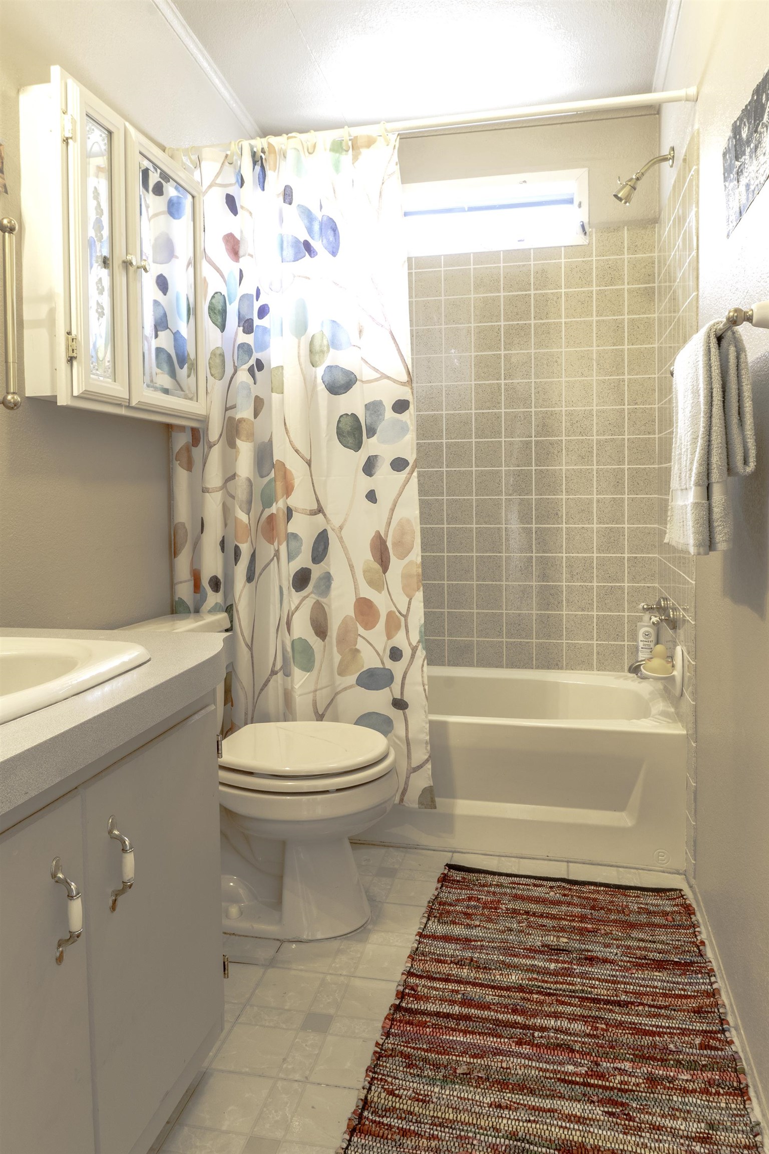 18 Eagle-Peak Bridgeport, CA 93517 - Photo 23 of 45 a bathroom with a toilet and a shower curtain