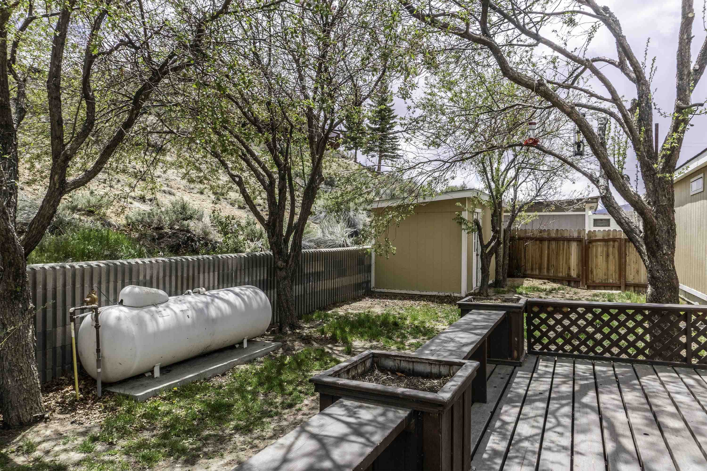 18 Eagle-Peak Bridgeport, CA 93517 - Photo 30 of 45 a front view of a house with garden