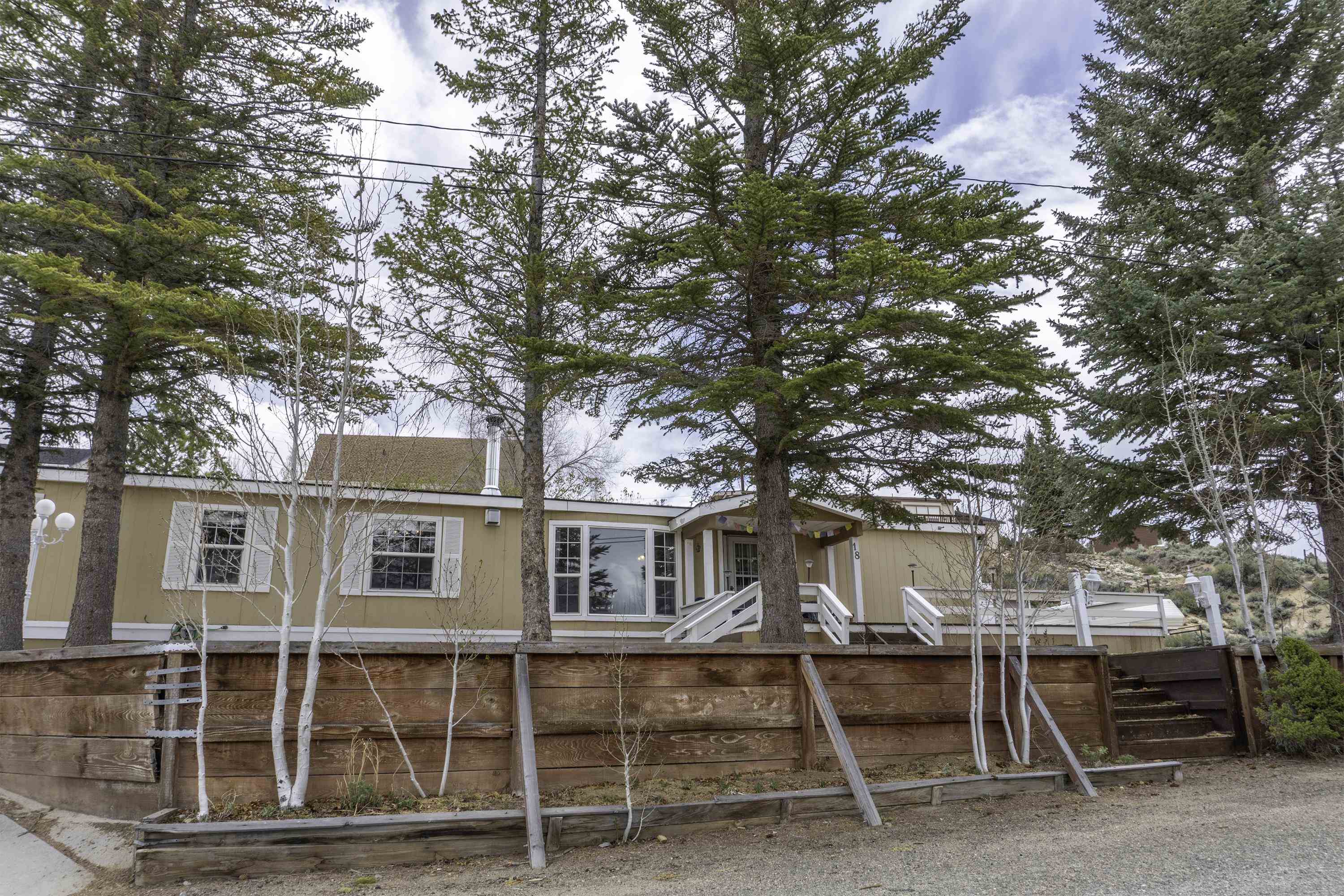 18 Eagle-Peak Bridgeport, CA 93517 - Photo 41 of 45 a front view of a house with a tree